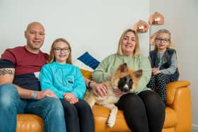 From left, Iain, Eliza, Kayleigh and Bella McDonald with their dog, Captain.