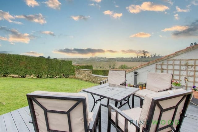 Through the double doors in the master bedroom and on to this exquisite garden terrace, where you can while away the hours sipping a glass of wine or a cup of coffee and marvelling at the views.