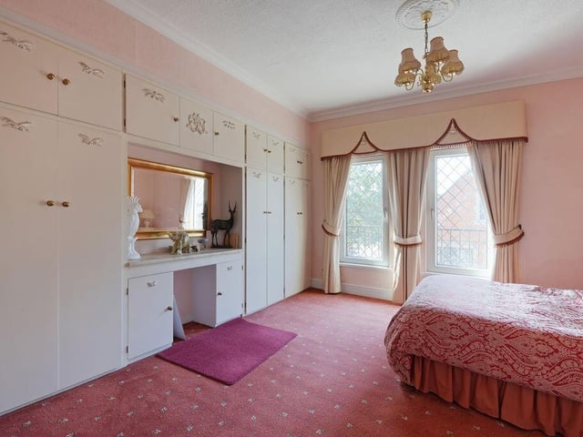 One of five bedrooms within the property.