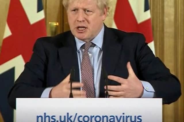 A screen-grab of Prime Minister Boris Johnson (centre) speaking at a media briefing in Downing Street, London, on Coronavirus (COVID-19) after he had taken part in the governmentÕs COBRA meeting. PA Video/PA Wire
