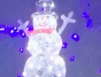 A three-foot snowman stolen from the family home
