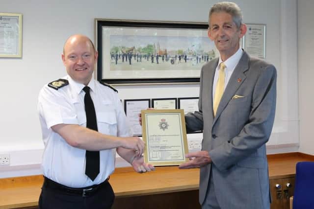 Chief Constable Craig Guildford presented Bob Fox with a certificate of recognition and long service earlier this month.