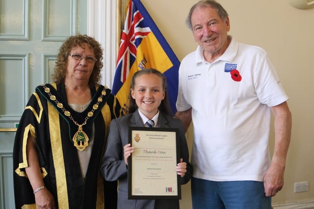 Sparken Hill Academy student Penelope Flower with coun Madelaine Richardson and David Scott, chair of Worksop RBL branch.
