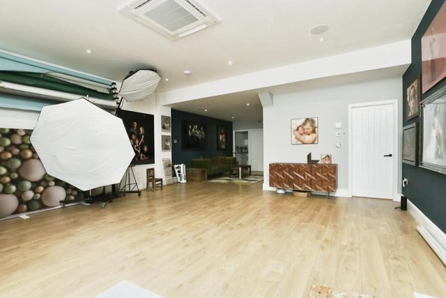 A quick look inside the property's annexe reveals that it is currently being used as a studio. A flexible space, it is fitted with a kitchenette and WC, and has access to a ground-floor storage room that could be used as a gym or a fourth bedroom.