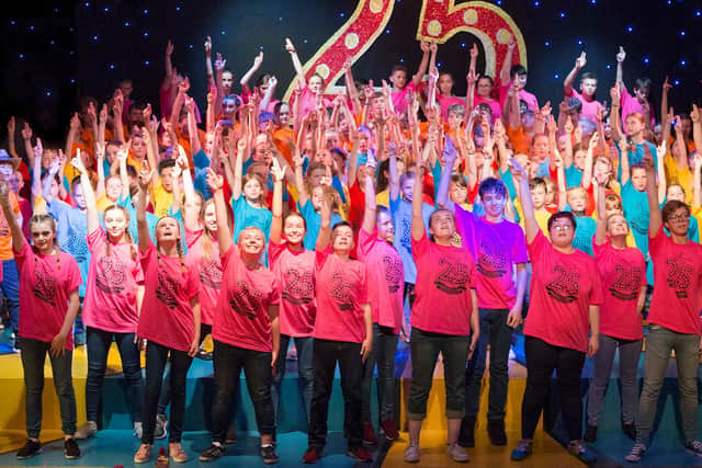 The entire company during their 25th anniversary show