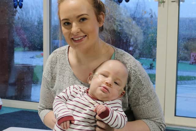 Three-year-old George and mum Hanna receive vital support from Bluebell Wood, North Anston.