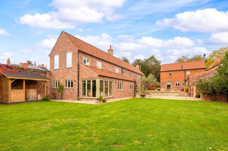 A view of the cottage from its extensive garden.