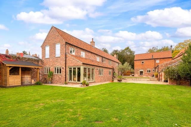 A view of the cottage from its extensive garden.