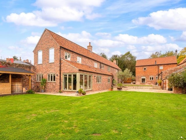 A view of the cottage from its extensive garden.