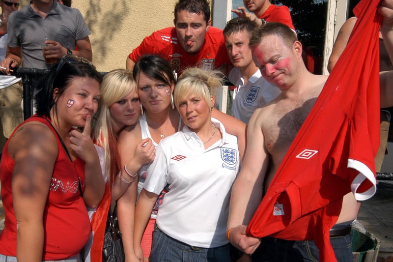 England fans in despair over the scoreline at The Liqourice Gardens after an England World Cup match.