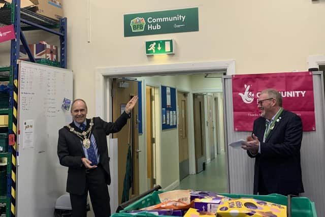 Worksop Mayor coun Tony Eaton unveiled the brand new 'Community Hub' sign in the Bassetlaw Food Bank premises.