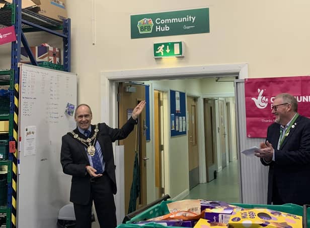 Worksop Mayor coun Tony Eaton unveiled the brand new 'Community Hub' sign in the Bassetlaw Food Bank premises.