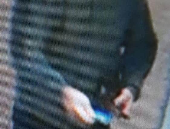 Officers from Nottinghamshire Police want to speak to this man in connection with a cash machine theft in Retford.
