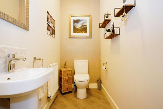 The downstairs cloakroom comes in handy, especially when visitors are around. It is fitted with a WC, wash hand basin and central heating radiator.