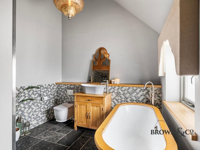 One of two stylish bathrooms within the property.