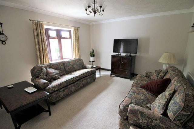 The lounge at the £425,000 cottage is the ideal spot for a relaxing night in, watching the telly.