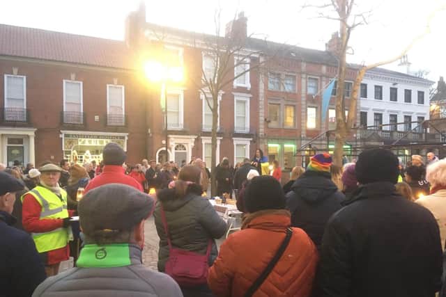 Many gathered outside Retford Town Hall for a candlelit vigil in support of Ukraine earlier this month. Credit: Richard Harris