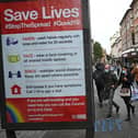 A board displaying information on how to restrict the spread of Covid-19 in central Nottingham in October 2020. (Photo: OLI SCARFF/AFP via Getty Images)
