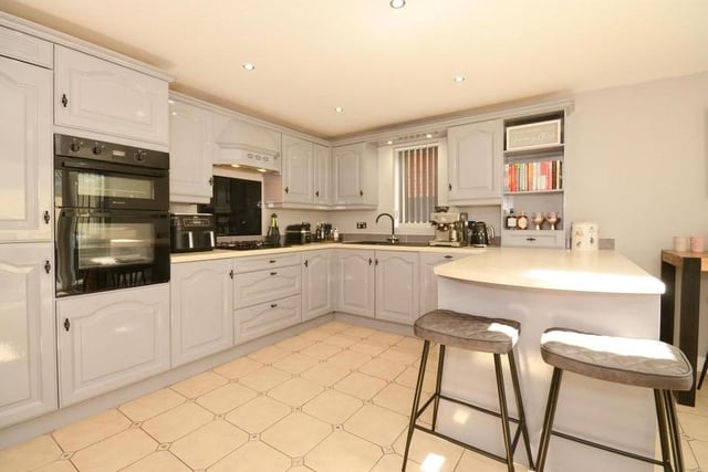 The kitchen can only be described as superb. It is equipped with a range of modern units and appliances, plus a breakfast bar.