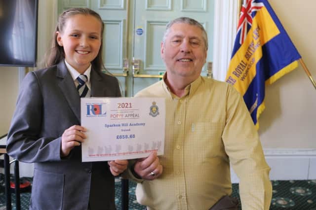 Sparken Hill Academy student Penelope Flower pictured with Tim Lewis of Worksop RBL branch.