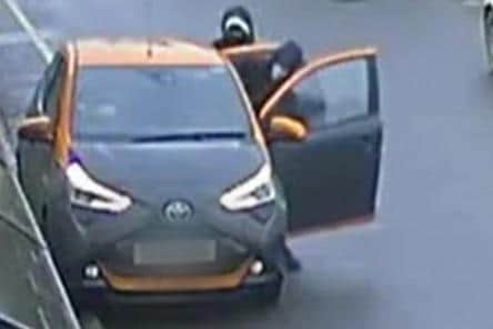 The Toyota Aygo with a bright orange roof was easy to spot on CCTV.