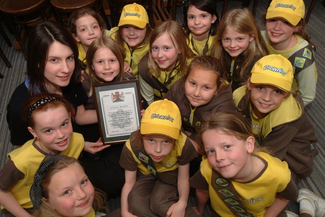 Kim Brereton, 19, received the Queen's Guide Award for her achievements as a Brownie/Guide Leader in 2009.  Kim, currently working as a Assistant Guider, 2nd Carlton-in-Lindrick Brownies, is only the 4th person to gain this award in the Worksop Division in 23 years.
Picture: Kim Brereton, 19 with some of her Brownies.