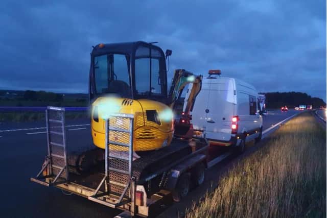 The van towing a digger, stolen from Worksop, was stopped by police on the A1.