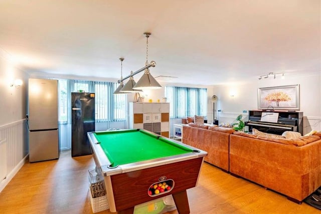 As things stand, the games room or family room contains a piano and a pool table. But it is very flexible and could easily be converted, for instance, into a gym.