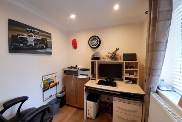 Another appealing facet of the Kirkby property is that it lends itself to working from home if required - thanks to this compact study. The room has a laminated floor and recessed spotlights to the ceiling.