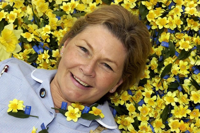 Lesley Limb celebrates being crowned Marie Curie Cancer Care nurse of the year in central London, Wednesday May 12, 2004. Limb, 55, of Worksop, Nottinghamshire, beat more than 1,700 Marie Curie nurses in England for the coveted title. PA Photo: Chris Young