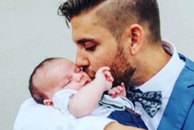 Jade's husband Ric Hart pictured with baby Hugo.