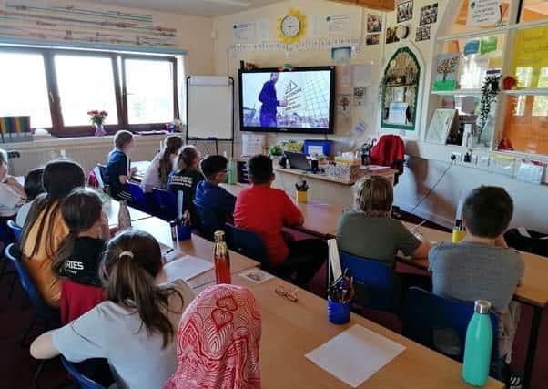 The pupils at Gateford Park Primary School watching Barratt Homes' site safety video