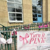 Louise Gladwin, fundraising manager at Aurora Worksop, with bra bunting and ribbons for the campaign.