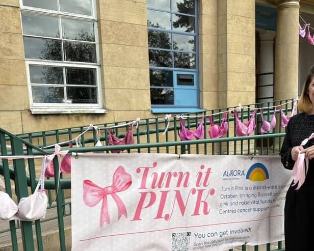 Louise Gladwin, fundraising manager at Aurora Worksop, with bra bunting and ribbons for the campaign.