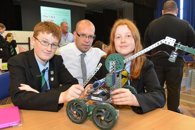 High Tunstall College of Science STEM Co-ordinator Jonathan Turner with pupils Elliot Fox and Jessica Hill with their robotic creation. Does this bring back memories from 6 years ago?