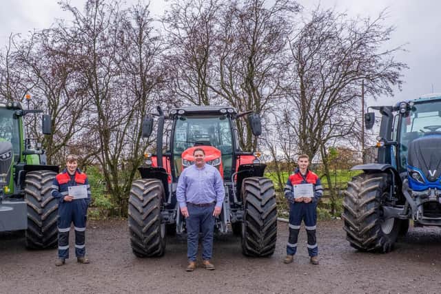 Agricultural Engineering Apprentice award winners Frazer Cross, left, and Lewis Woodward, right, with Andrew Walker of B&B Tractors.