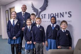 Mr Gez Rizzo, Principal of St John’s C of E Academy with children.