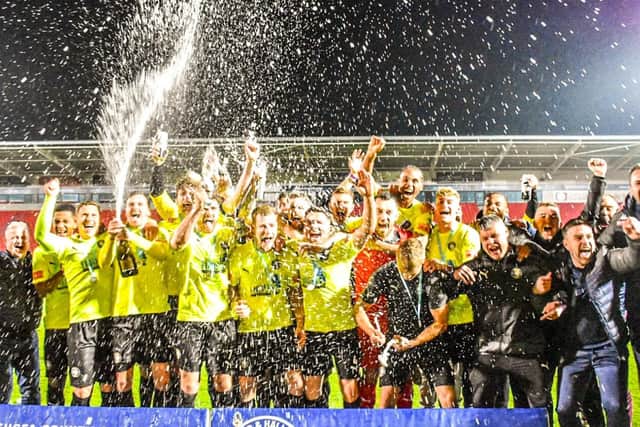 Worksop Town celebrate winning the Sheffield Senior Cup. Pictures by Lewis Pickersgill