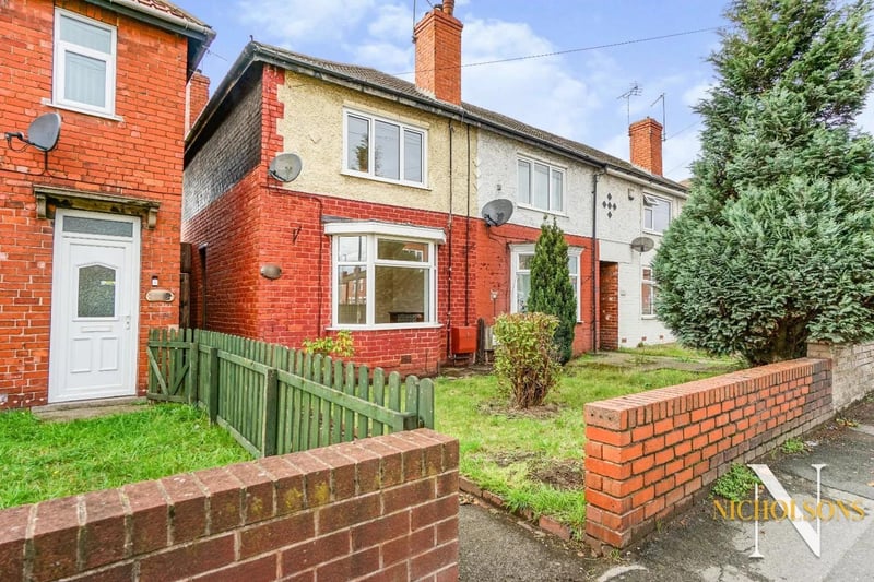 Listed on Zoopla by Nicholsons Properties is this two-bedroom home, described as perfect for first-time buyers or investors. It boasts large wooden-floored rooms and a large garden.