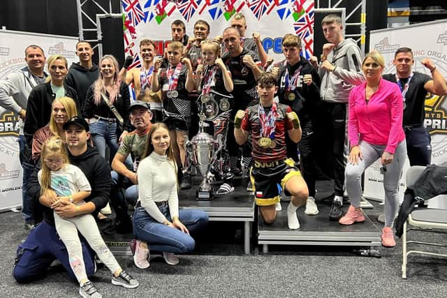 Members of Worksop’s Street Kickboxing Club celebrate their success.