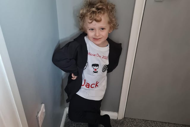 Jack, aged five, looked quite the man as he struck a sassy pose in his personalised Red Nose Day t-shirt.
