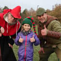 The Sheriff, Robin Hood and last year’s Lord of Misrule, five-year-old Tenzin. Credit: Rob James
