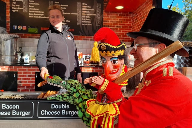 The crocodile fancied a sausage when Mr Punch and Paul Temple visited Bishton's Catering's stall.