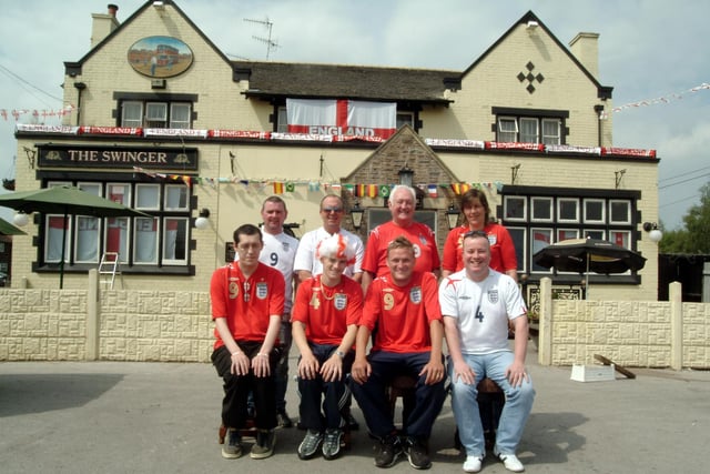 Regulars at the Swinger Pub Bulwell are the official team responsible for the decoration of the pub in England flags, 2006.