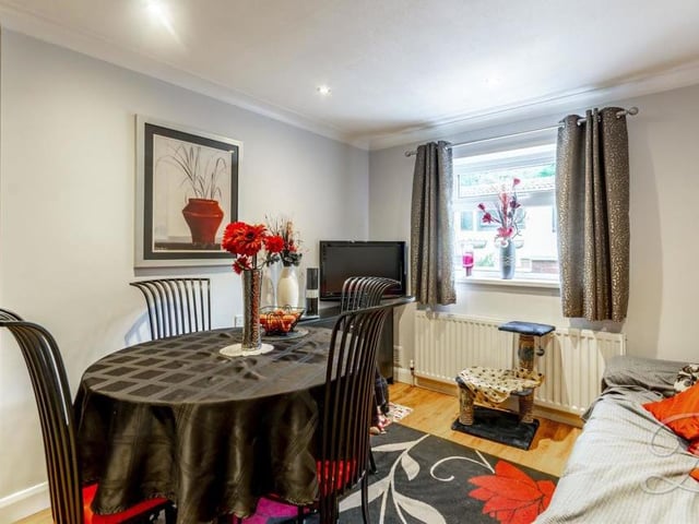 Here is the third bedroom, which is so versatile that it has been set up as a pleasant dining room by the current owner. It has laminate flooring, downlights, central heating radiator and a window facing the back of the property.