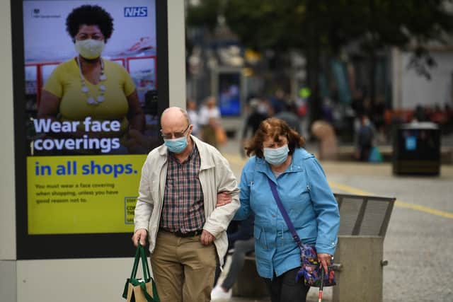 Anyone caught breaking the new coronavirus laws could be fined up to £10,000 (Photo by OLI SCARFF/AFP via Getty Images)