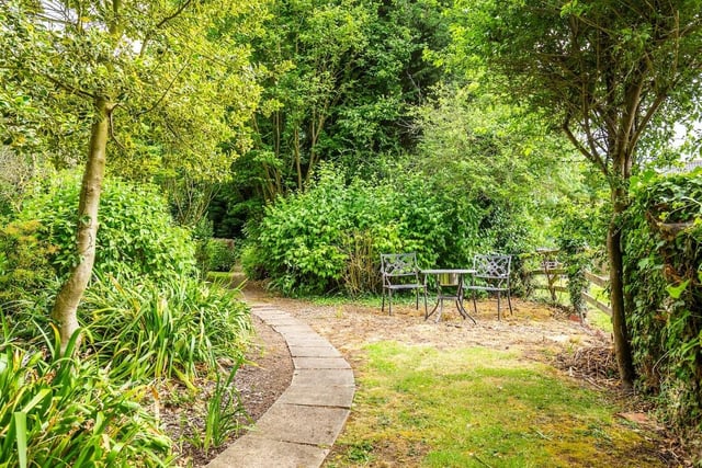 The separate garden offers the opportunity for a stroll or maybe a sit-down.