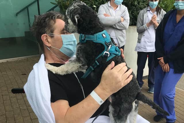 Bob is reunited with his faithful pal - Lowchen dog Arthur