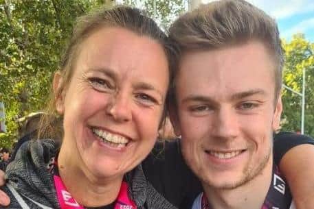 Carole Botham with Dan Kneller at the end of the London Marathon