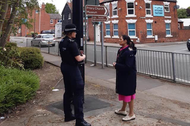 Home secretary Priti Patel and inspector Hayley Crawford, district commander for Bassetlaw, at the refuge point on Potter Street, Worksop.